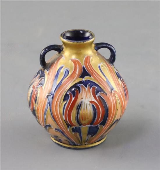 A Moorcroft Macintyre pink Florian ware miniature two handled vase, c.1904-08, H.5.5cm